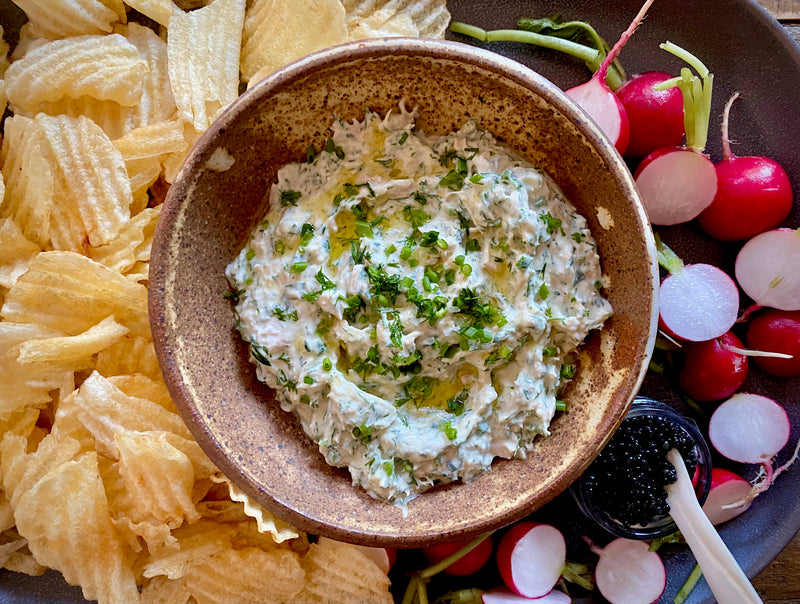 herby tuna dip with fresh herbs, zesty garlic, and fresh lemon juice; served with ruffles and caviar